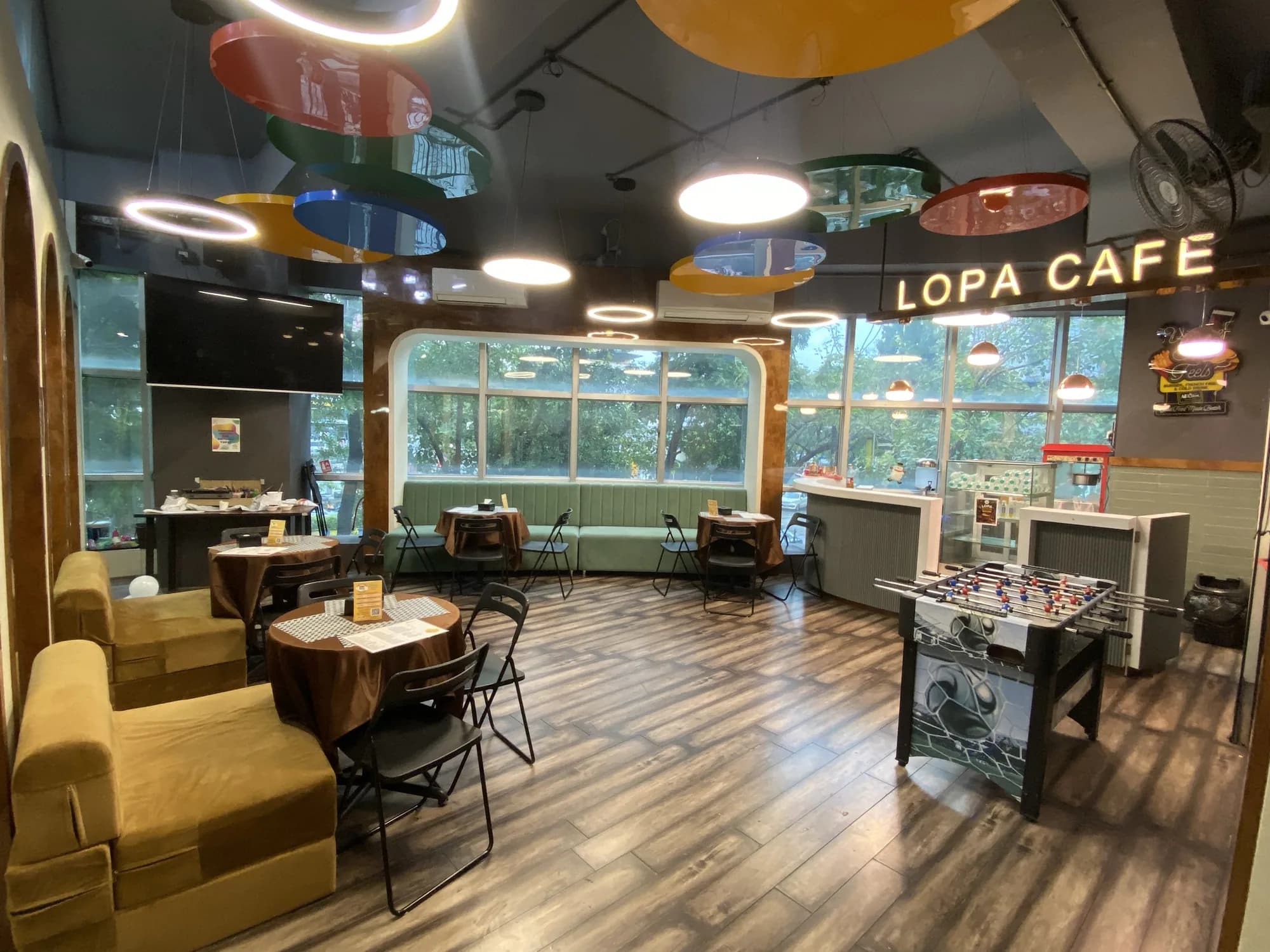 Bright seating area inside Lopa Cafe