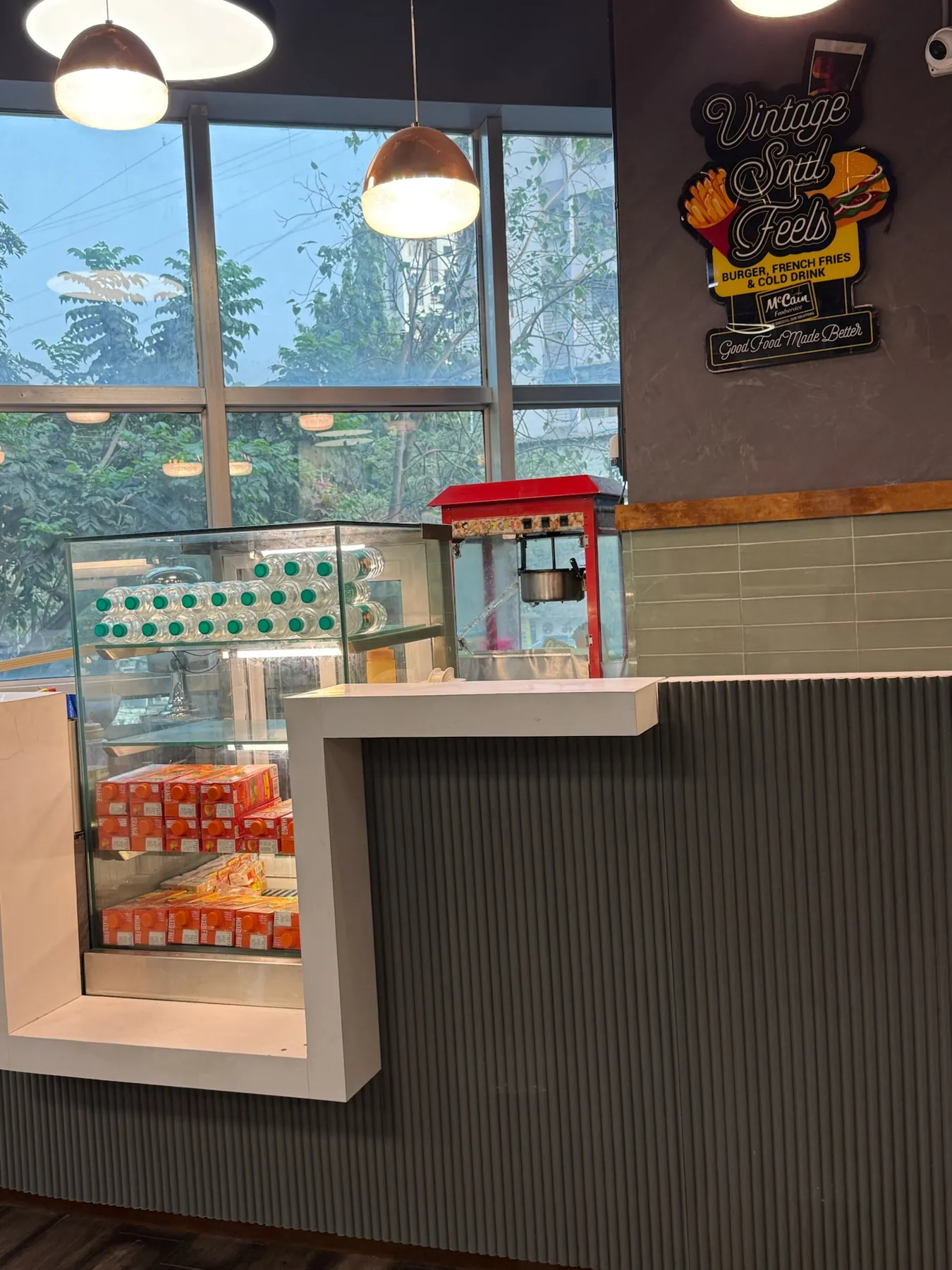 The Lopa Cafe counter stocked with drinks and snacks