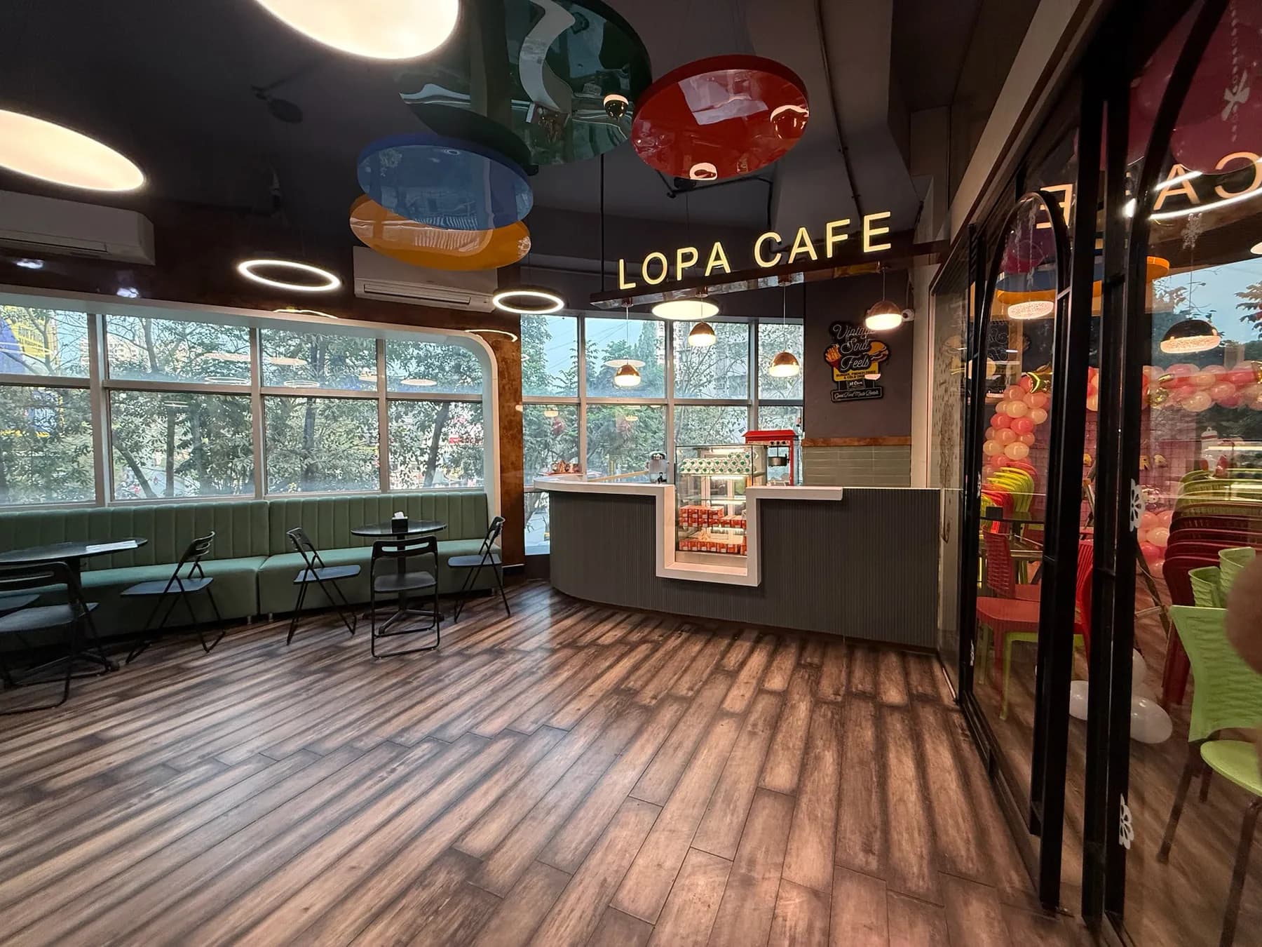 The Lopa Cafe sign above the seating area